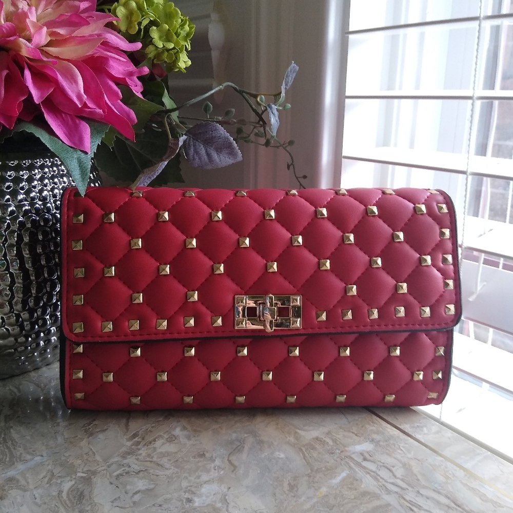 Red clutch with gold studs